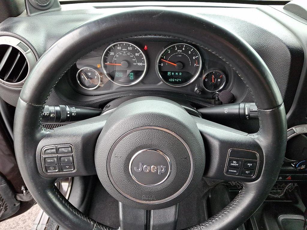 used 2013 Jeep Wrangler Unlimited car, priced at $17,698
