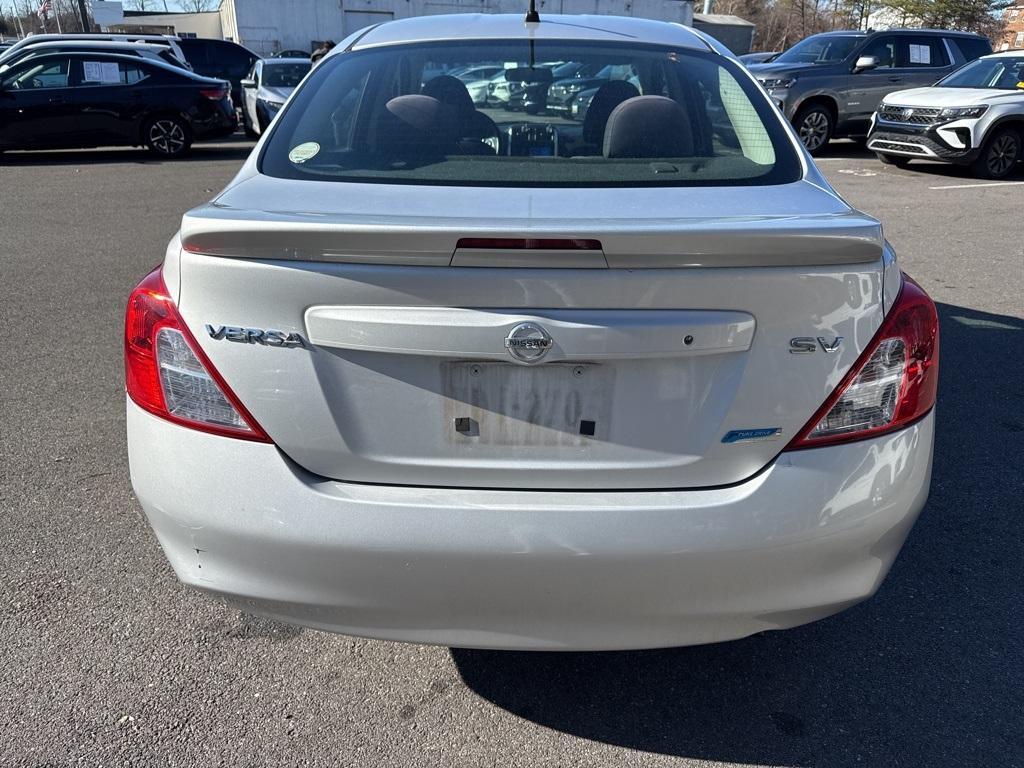 used 2014 Nissan Versa car, priced at $6,500