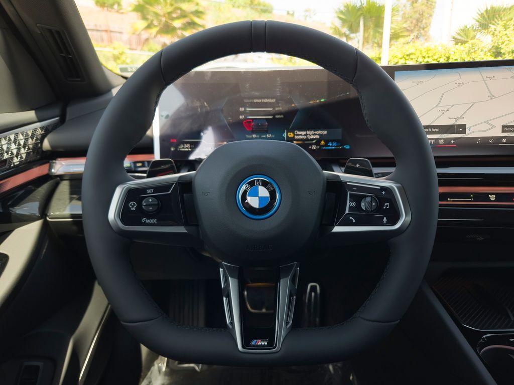 new 2026 BMW 550e car, priced at $84,015