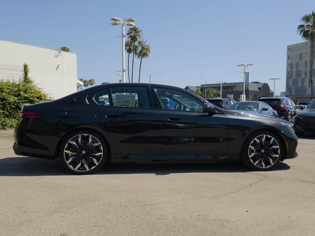 new 2026 BMW 550e car, priced at $84,015