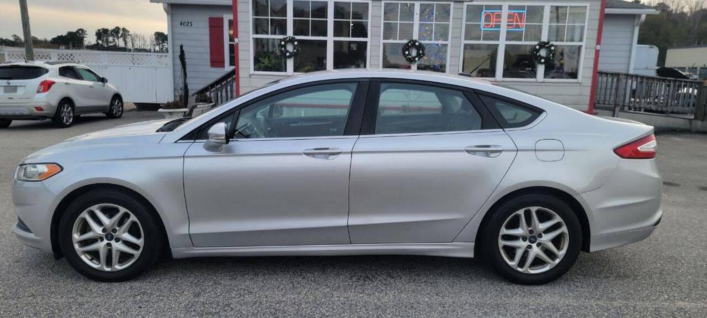 used 2016 Ford Fusion car, priced at $8,950