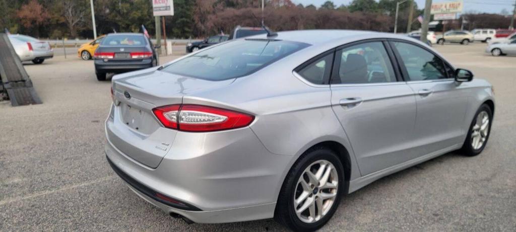 used 2016 Ford Fusion car, priced at $8,950