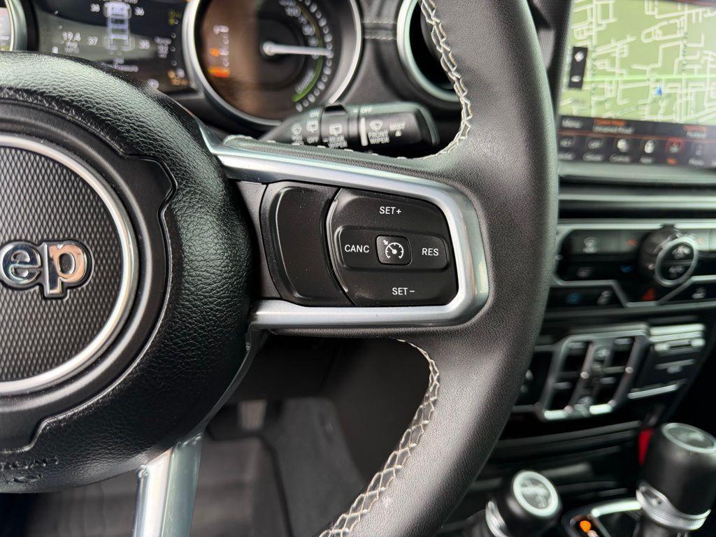 used 2023 Jeep Wrangler 4xe car, priced at $27,783