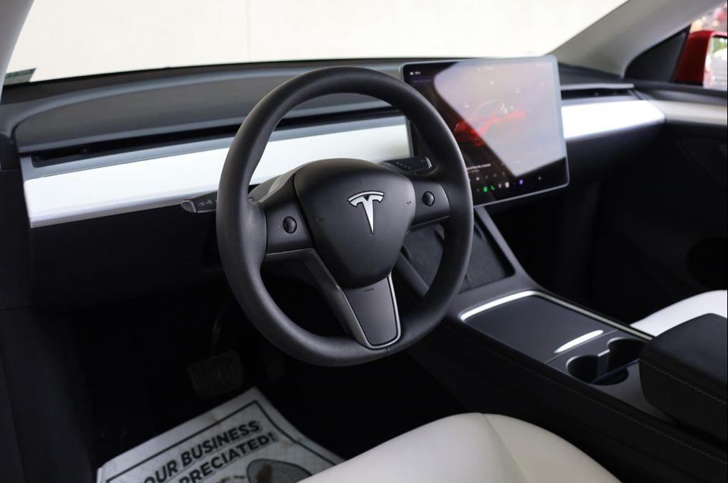 used 2024 Tesla Model Y car, priced at $35,757