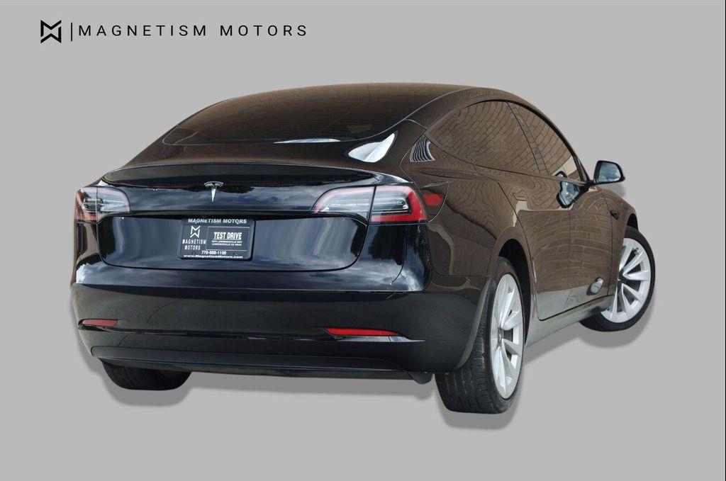 used 2023 Tesla Model 3 car, priced at $27,957