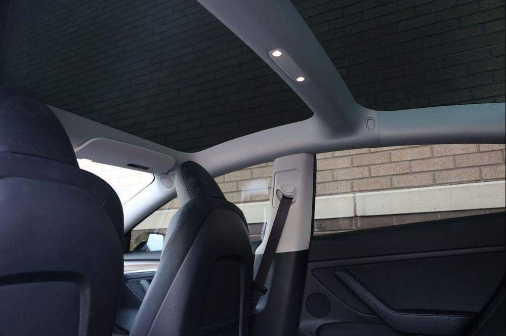used 2023 Tesla Model 3 car, priced at $27,957