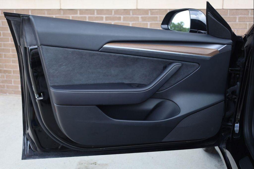 used 2023 Tesla Model 3 car, priced at $27,957