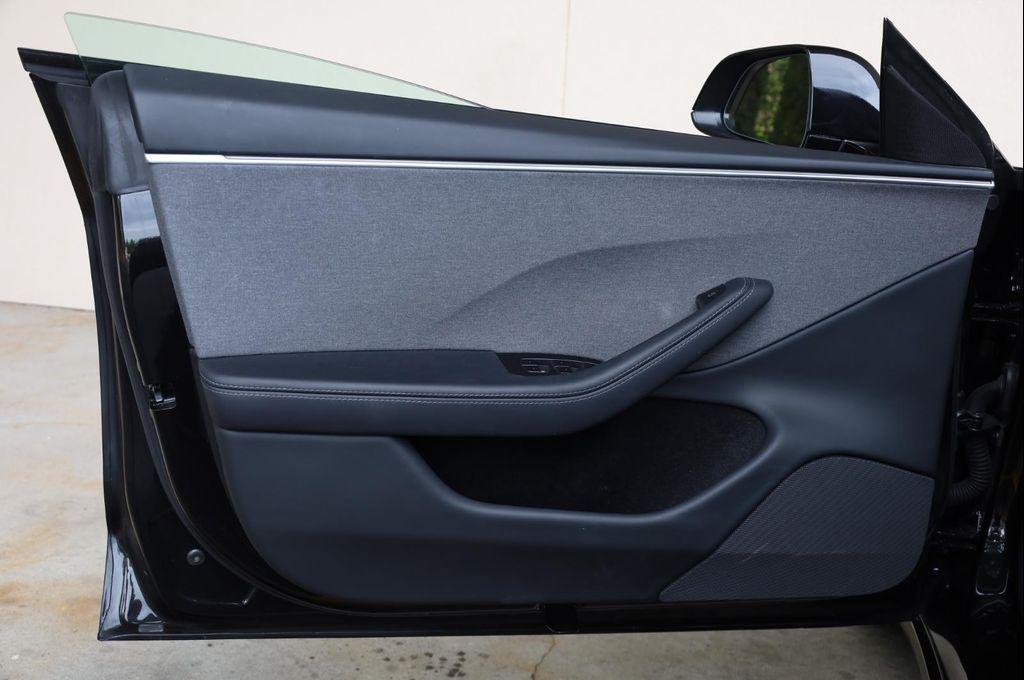 used 2025 Tesla Model 3 car, priced at $38,957