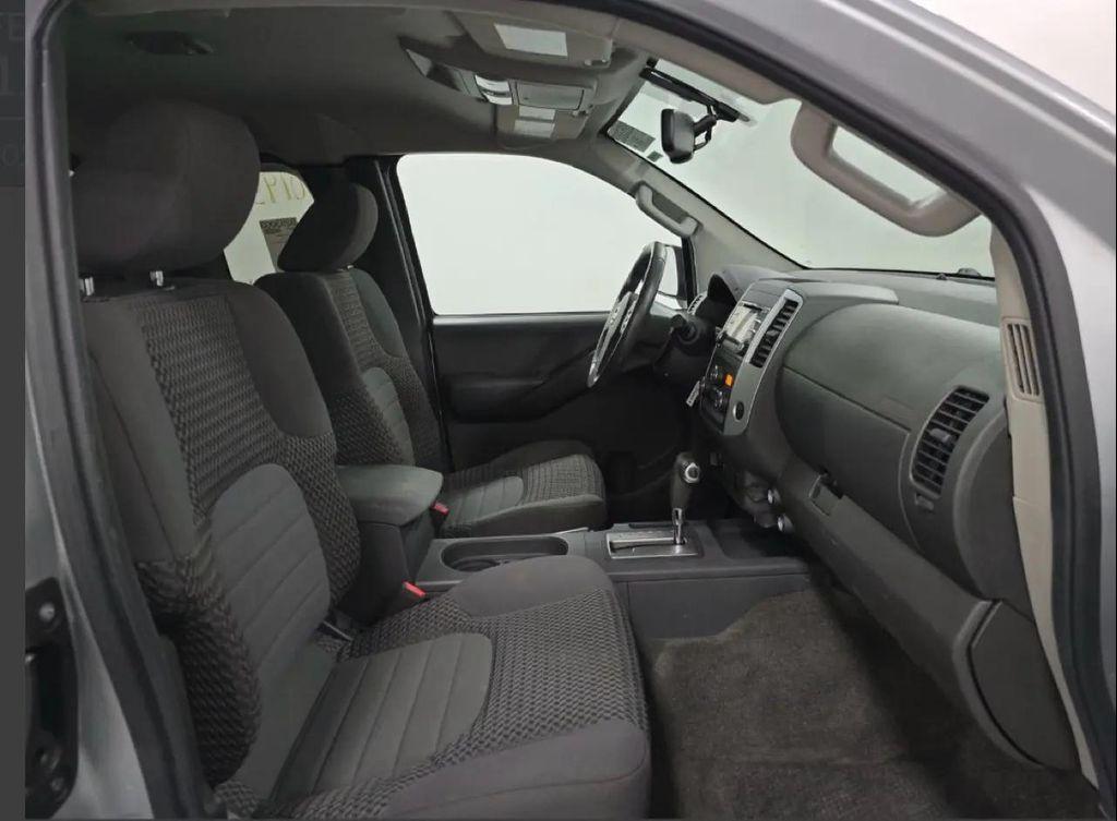 used 2013 Nissan Frontier car, priced at $18,900