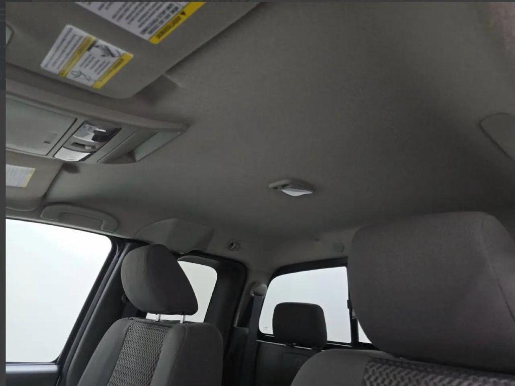 used 2013 Nissan Frontier car, priced at $18,900