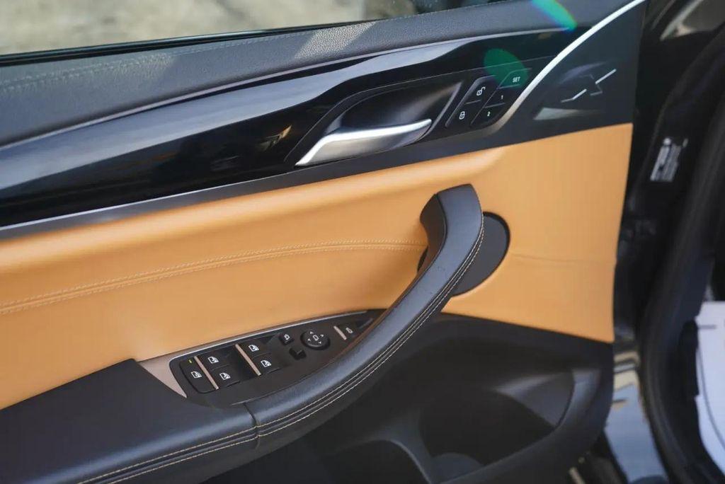 used 2022 BMW X4 M car, priced at $57,700