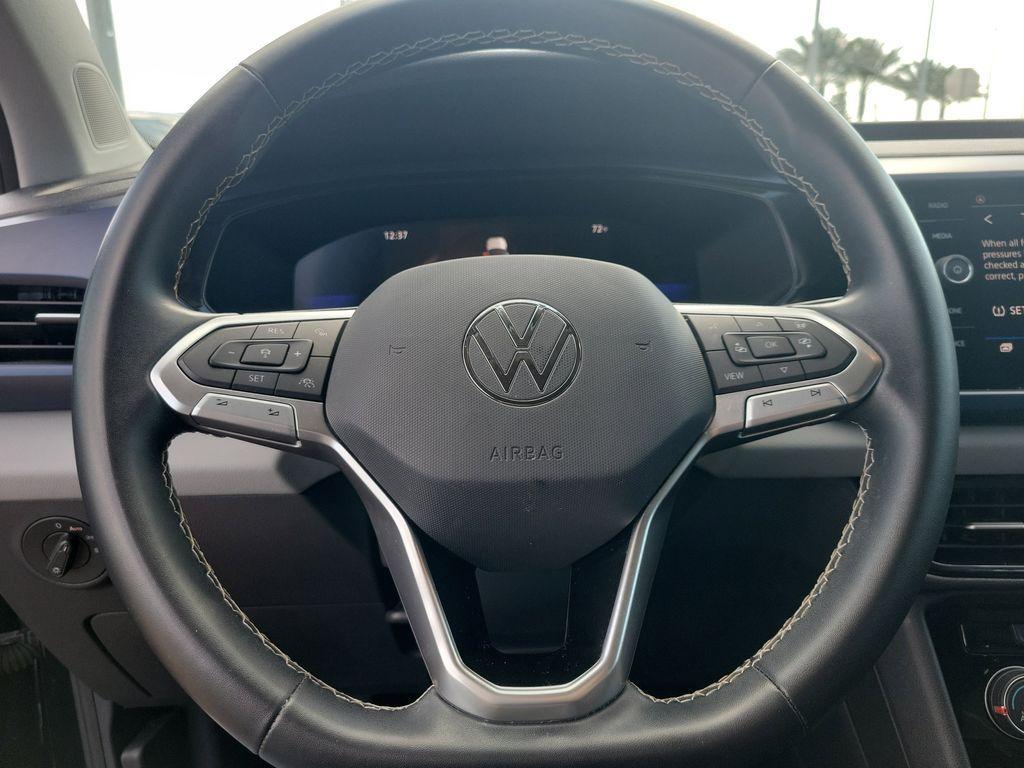 used 2023 Volkswagen Taos car, priced at $18,995