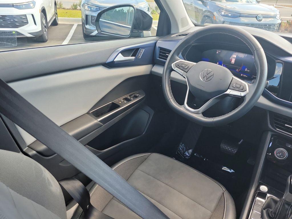 used 2023 Volkswagen Taos car, priced at $18,995