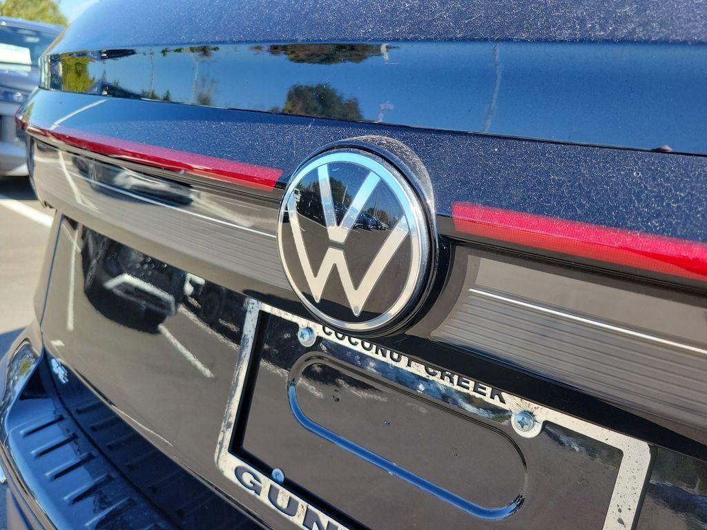 used 2025 Volkswagen Taos car, priced at $22,695