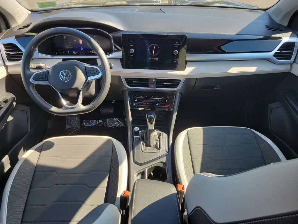 used 2025 Volkswagen Taos car, priced at $22,695
