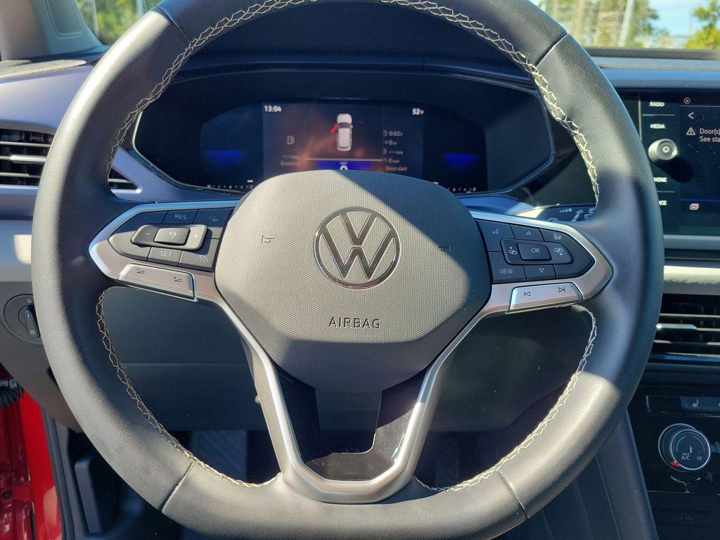 used 2023 Volkswagen Taos car, priced at $18,995