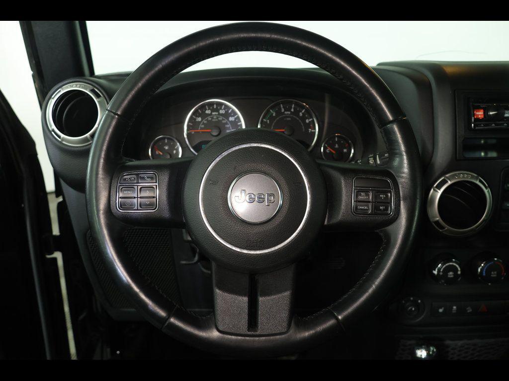 used 2017 Jeep Wrangler Unlimited car, priced at $19,944