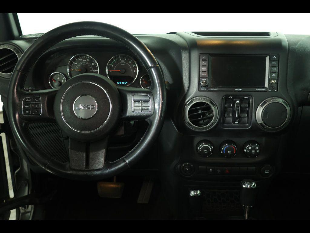 used 2016 Jeep Wrangler Unlimited car, priced at $16,534