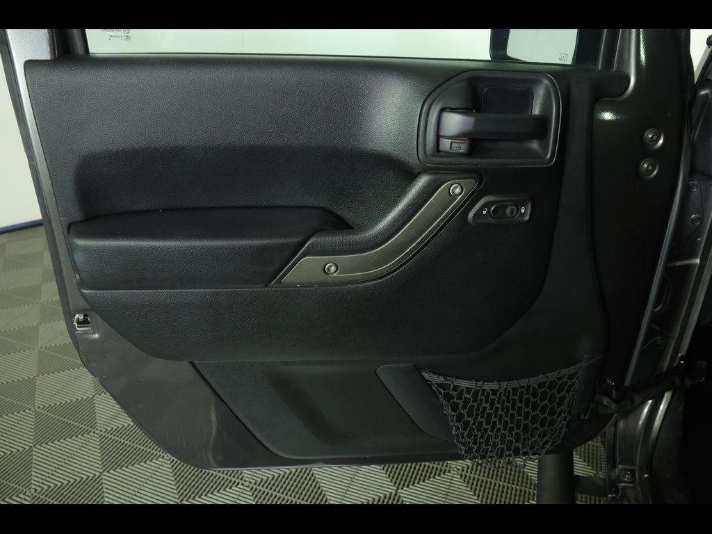used 2016 Jeep Wrangler Unlimited car, priced at $16,534