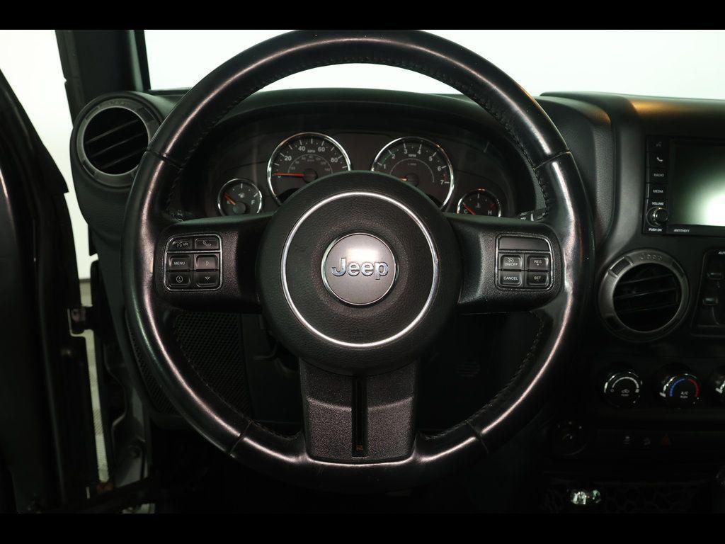 used 2016 Jeep Wrangler Unlimited car, priced at $16,534