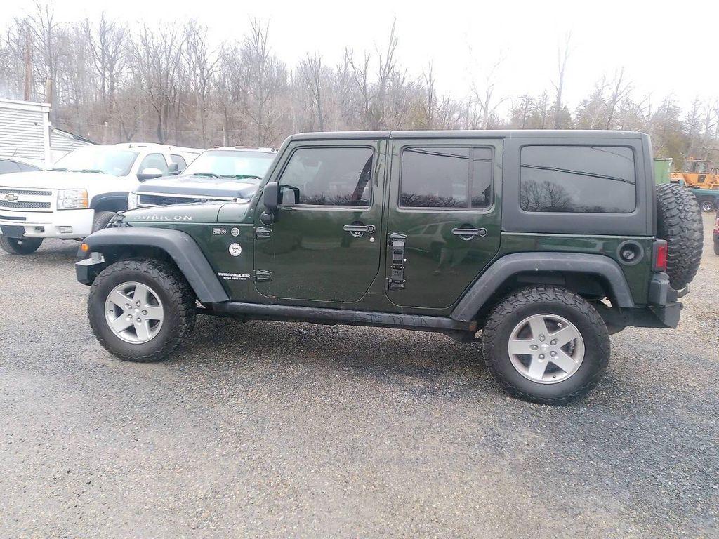 used 2011 Jeep Wrangler Unlimited car, priced at $11,995