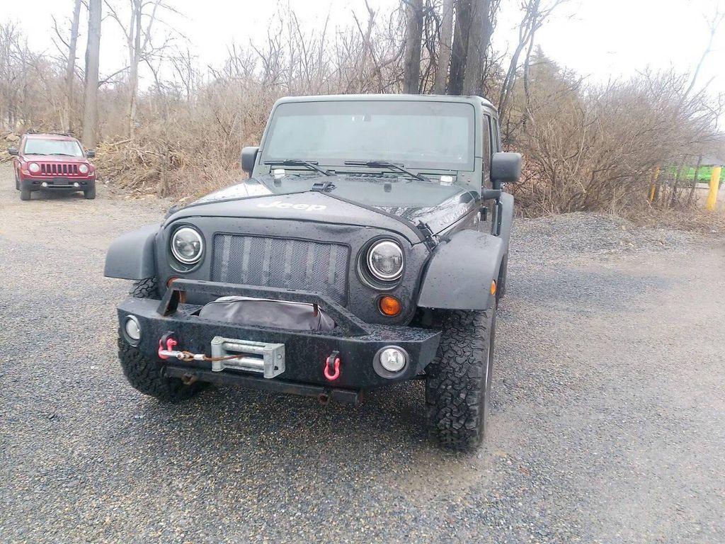 used 2011 Jeep Wrangler Unlimited car, priced at $11,995