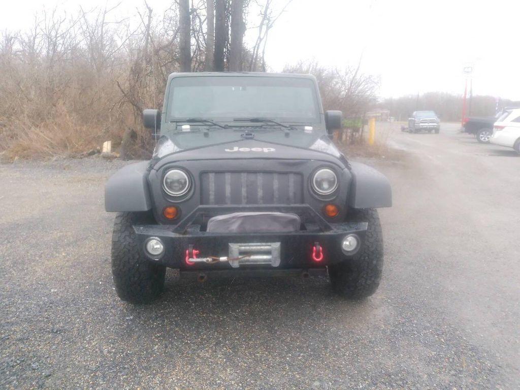 used 2011 Jeep Wrangler Unlimited car, priced at $11,995