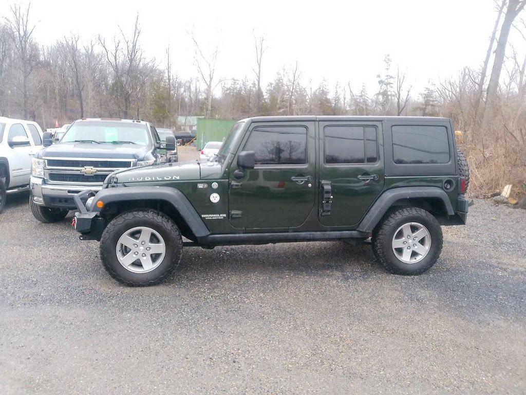 used 2011 Jeep Wrangler Unlimited car, priced at $11,995