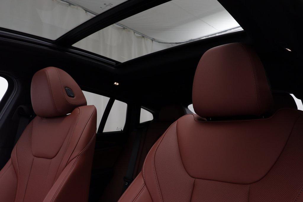 new 2025 BMW X4 car, priced at $61,185