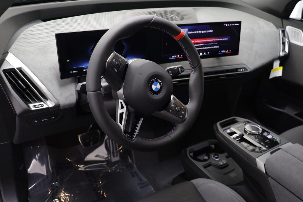 new 2026 BMW iX car, priced at $117,945