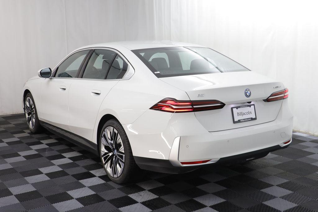 used 2025 BMW i5 car, priced at $63,977