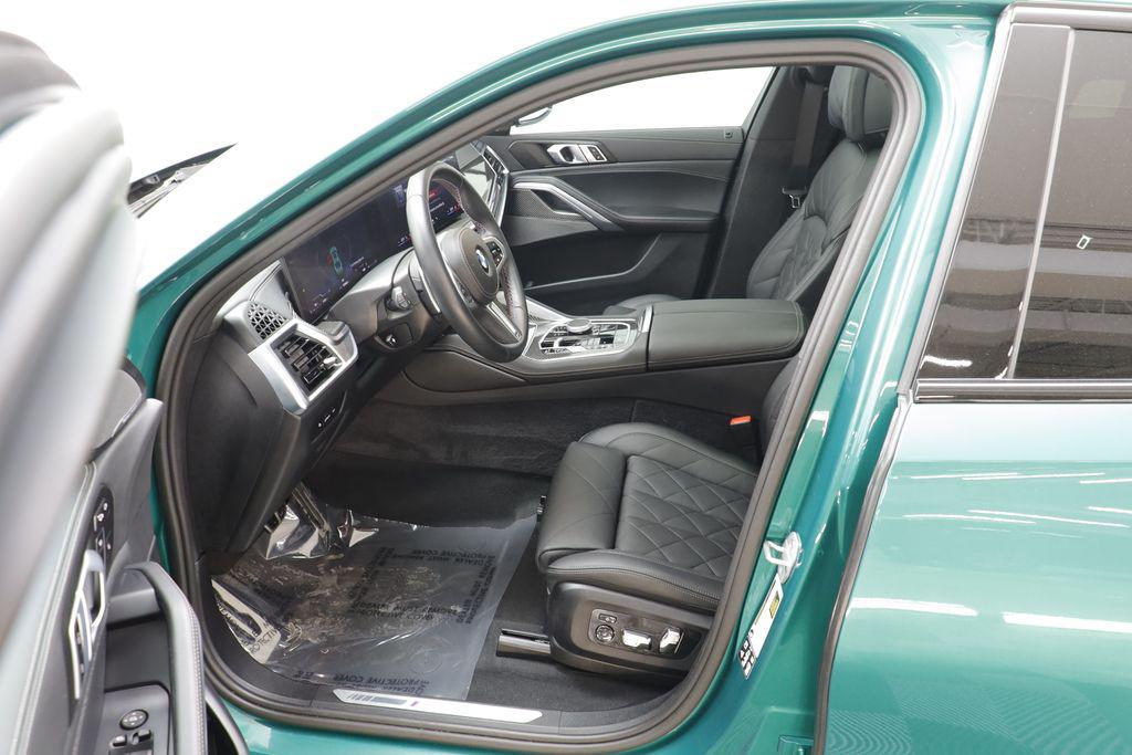 used 2025 BMW X6 car, priced at $86,977