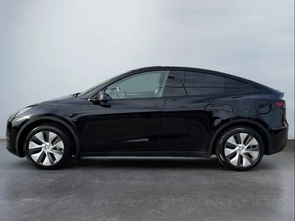 used 2025 Tesla Model Y car, priced at $34,494