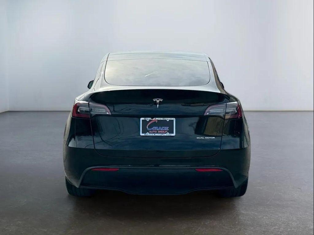 used 2025 Tesla Model Y car, priced at $34,494
