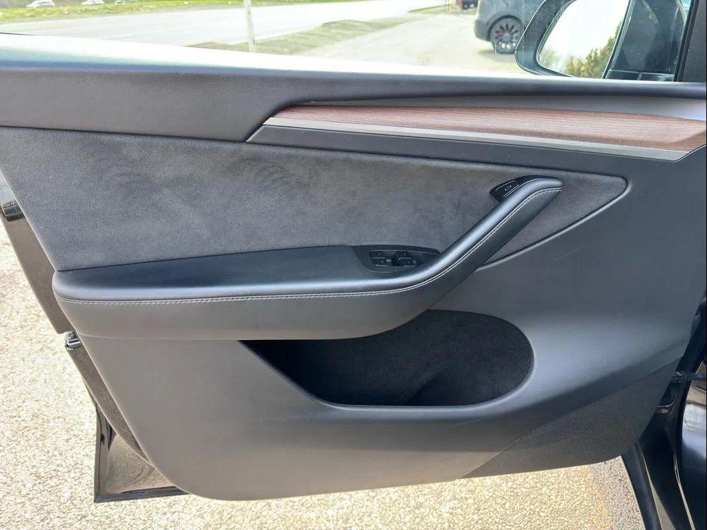 used 2025 Tesla Model Y car, priced at $34,494