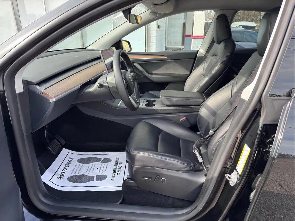 used 2025 Tesla Model Y car, priced at $34,494