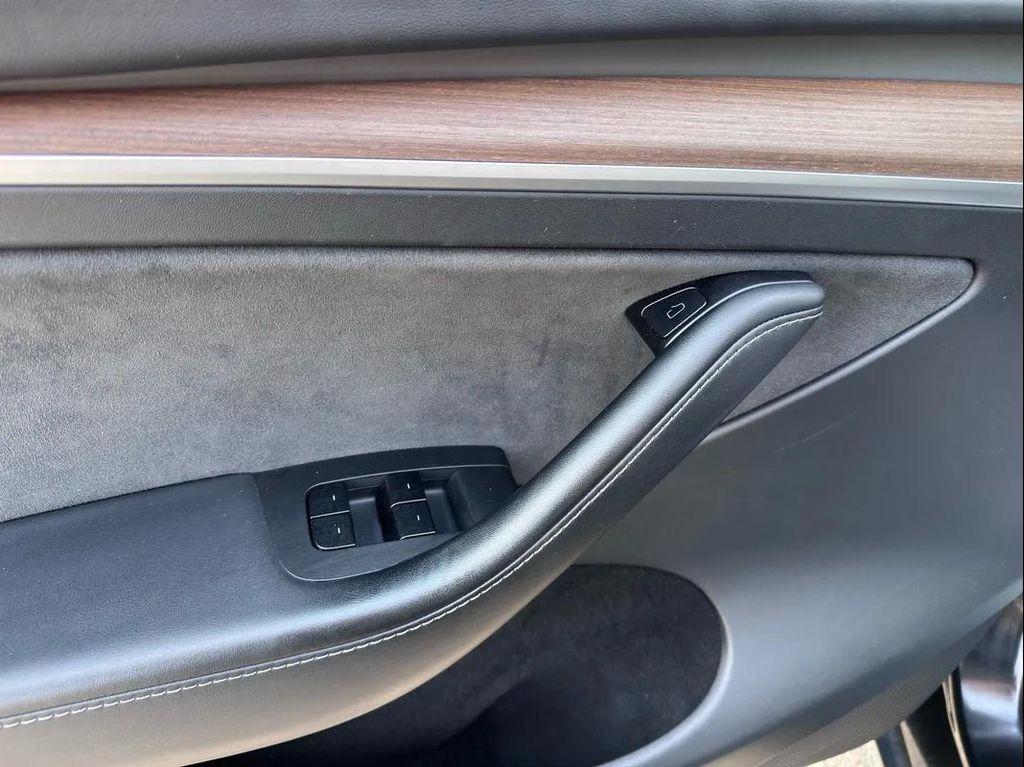 used 2025 Tesla Model Y car, priced at $34,494