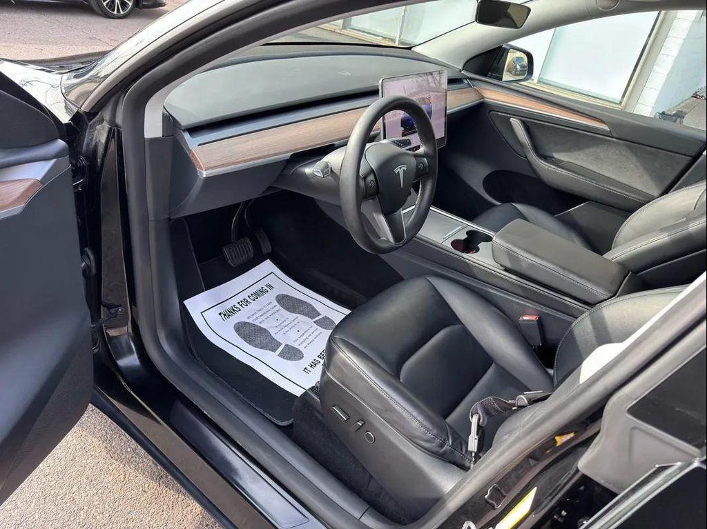 used 2025 Tesla Model Y car, priced at $34,494