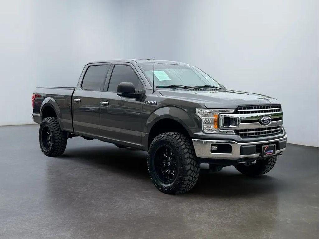 used 2018 Ford F-150 car, priced at $25,494