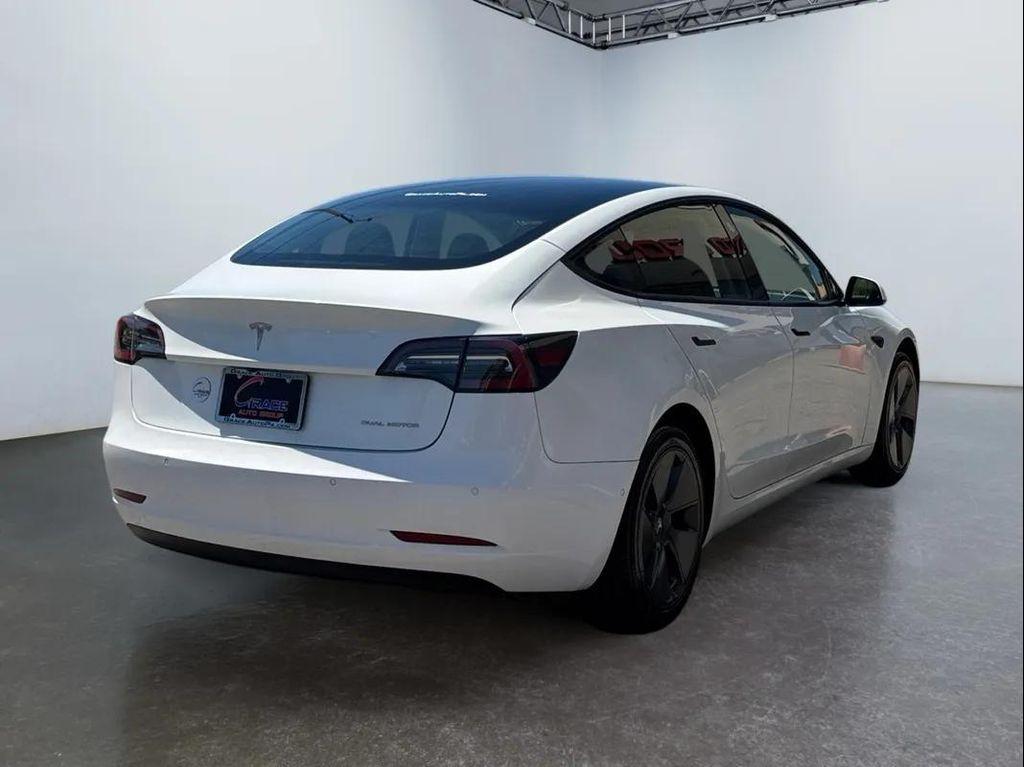 used 2022 Tesla Model 3 car, priced at $24,494