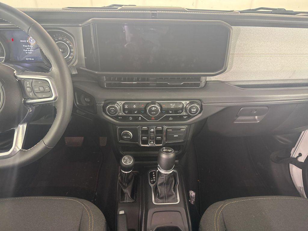 used 2025 Jeep Wrangler car, priced at $33,495