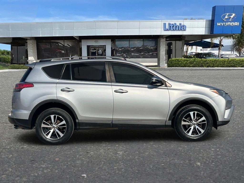 used 2018 Toyota RAV4 car, priced at $13,999