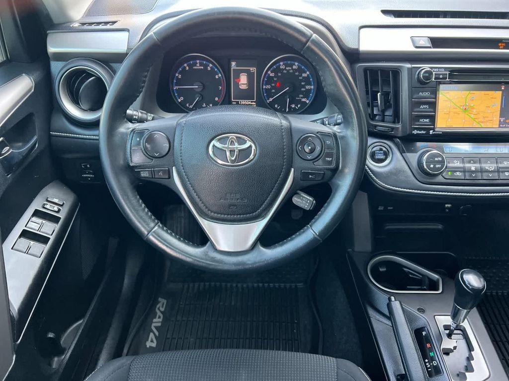 used 2018 Toyota RAV4 car, priced at $13,999