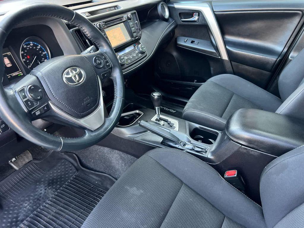 used 2018 Toyota RAV4 car, priced at $13,999