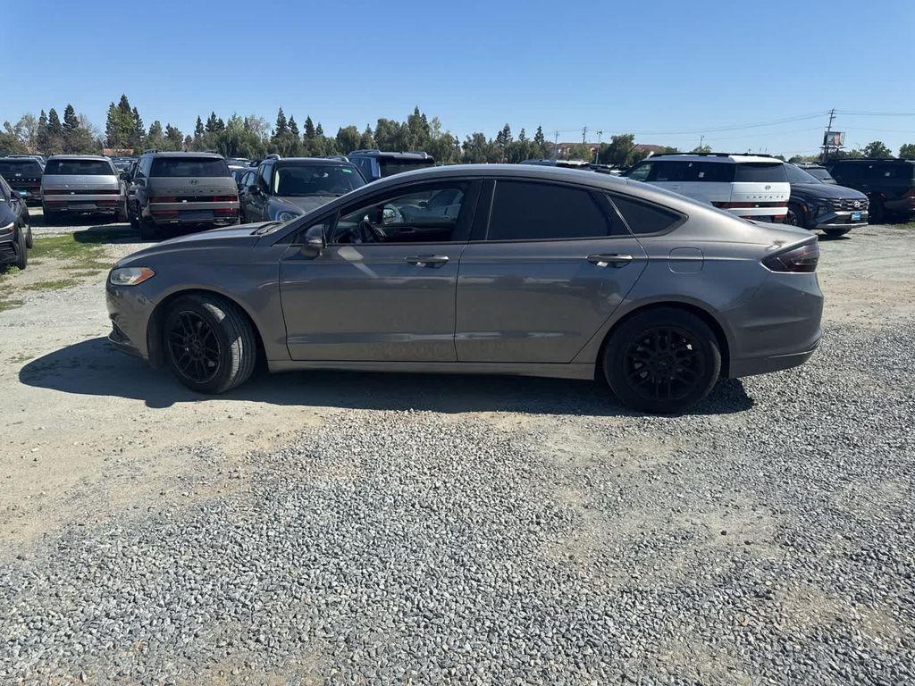 used 2014 Ford Fusion car, priced at $8,999