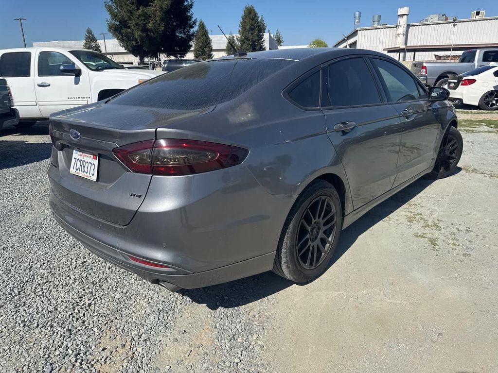 used 2014 Ford Fusion car, priced at $8,999