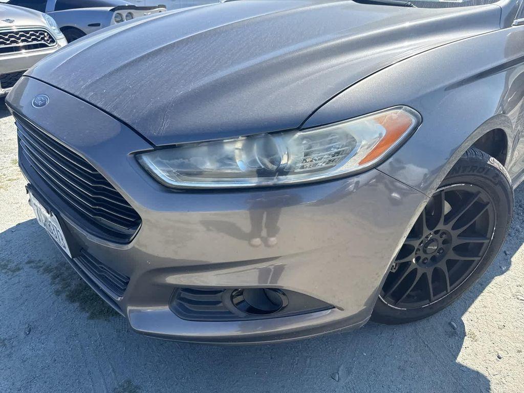 used 2014 Ford Fusion car, priced at $8,999