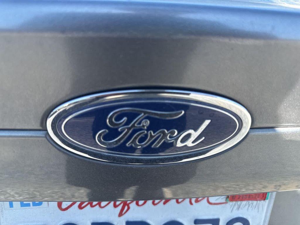 used 2014 Ford Fusion car, priced at $8,999
