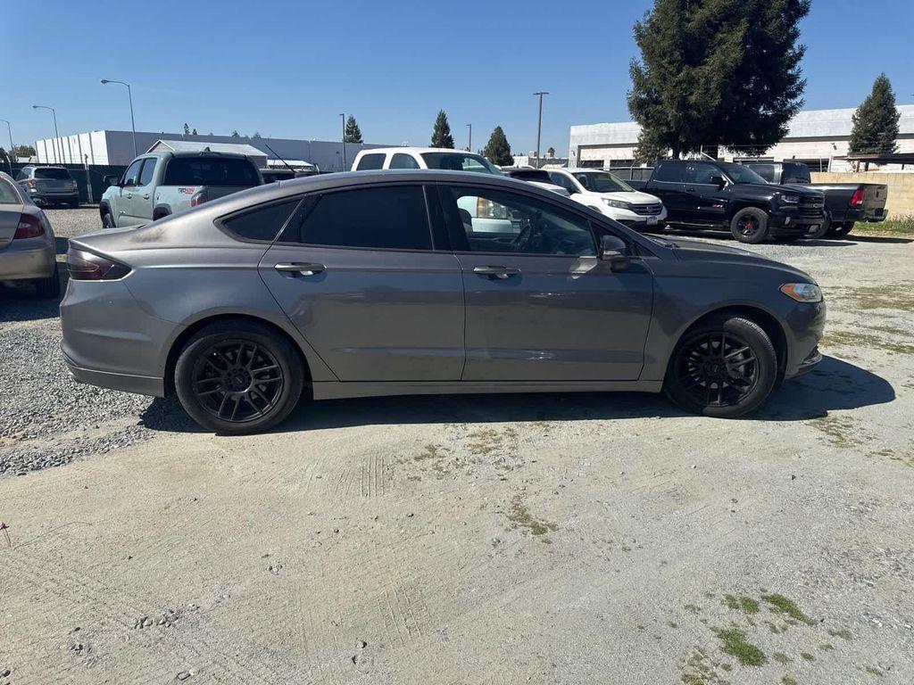 used 2014 Ford Fusion car, priced at $8,999