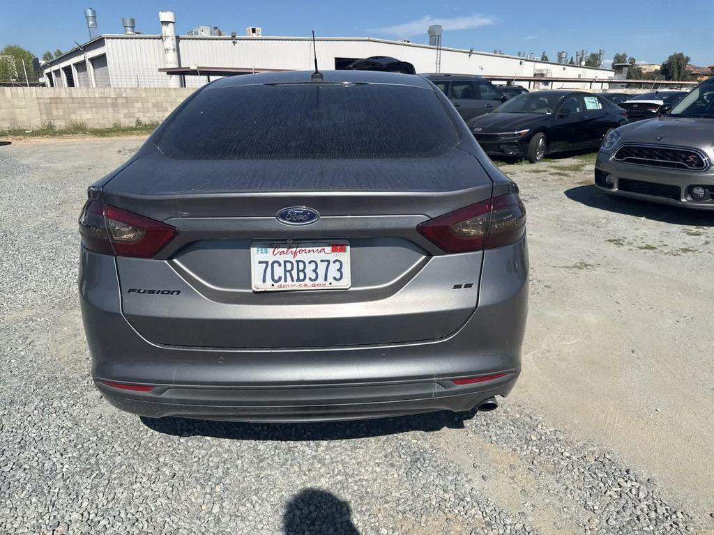 used 2014 Ford Fusion car, priced at $8,999